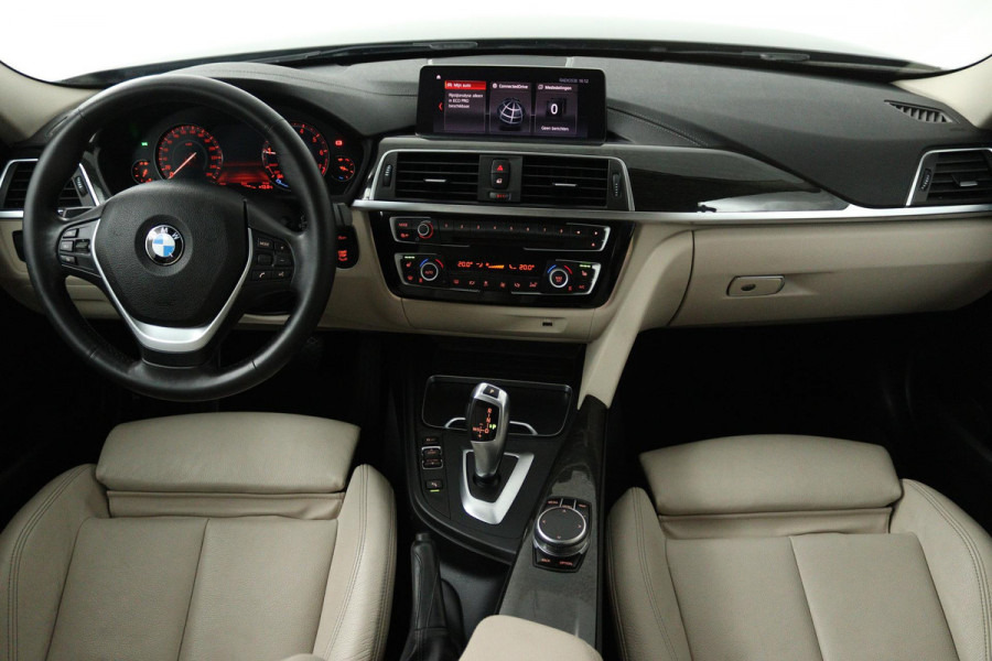 BMW 3 Serie 318i Luxury Edition (DEALER ONDERHOUDEN, PARKEERSENSOREN, NAVIGATIE, AUTOMAAT, CRUISE CONTROL)