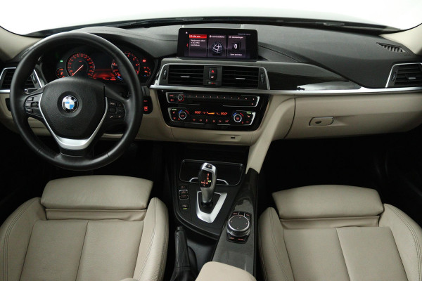 BMW 3 Serie 318i Luxury Edition (DEALER ONDERHOUDEN, PARKEERSENSOREN, NAVIGATIE, AUTOMAAT, CRUISE CONTROL)