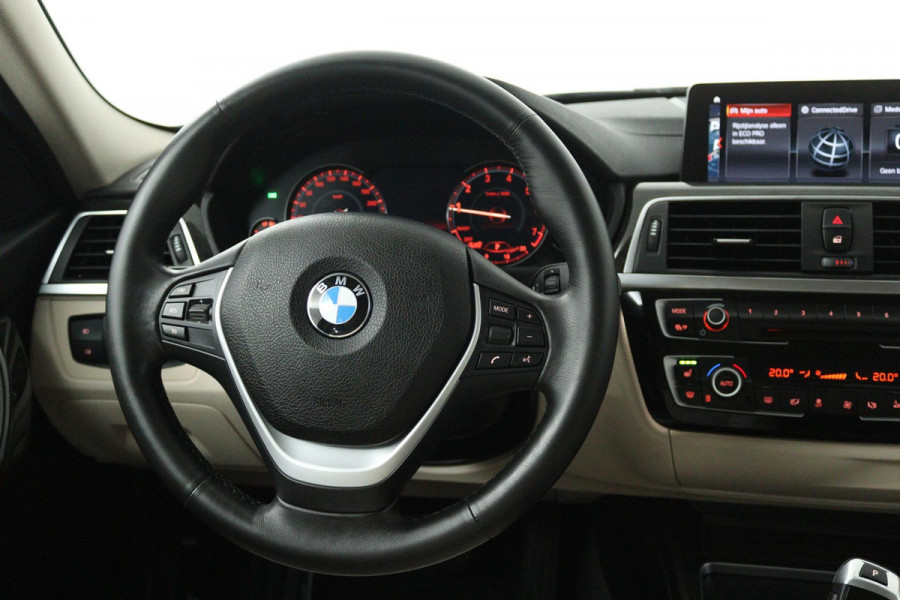 BMW 3 Serie 318i Luxury Edition (DEALER ONDERHOUDEN, PARKEERSENSOREN, NAVIGATIE, AUTOMAAT, CRUISE CONTROL)
