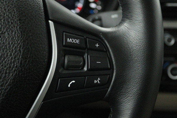BMW 3 Serie 318i Luxury Edition (DEALER ONDERHOUDEN, PARKEERSENSOREN, NAVIGATIE, AUTOMAAT, CRUISE CONTROL)