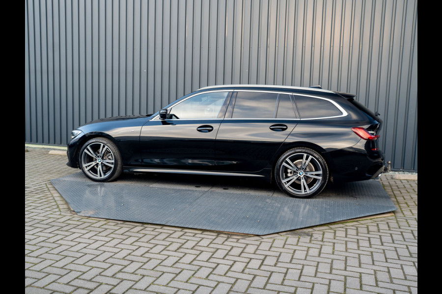 BMW 3-serie 320i High Executive | M-Sport | Laser | Stoelgeheugen | Trekhaak wegkl. | 19'' | Head Up | Camera | Keyless | Prijs Rijklaar!!