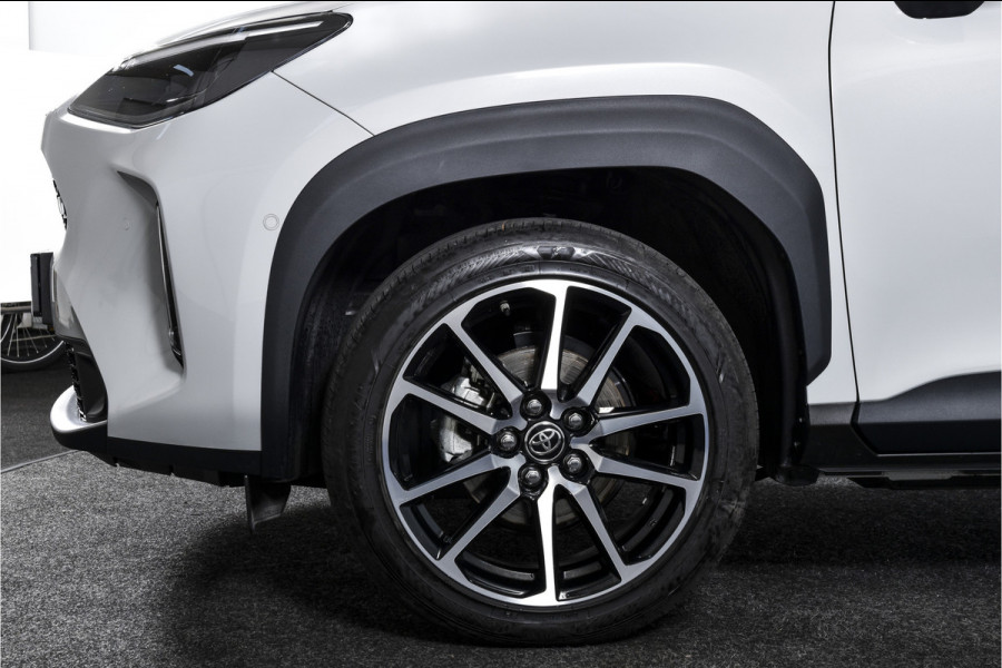 Toyota Yaris Cross 1.5 Hybrid 130 GR Sport - Automaat (Nieuw model) | Pano | Head-up Disp. | Dig.Cockpit | Adapt.Cruise | Stoel+Stuurverw. | 360 Camera | PDC | NAV + App.Connect (Draadloos) | JBL | ECC | LM 18" | 9057