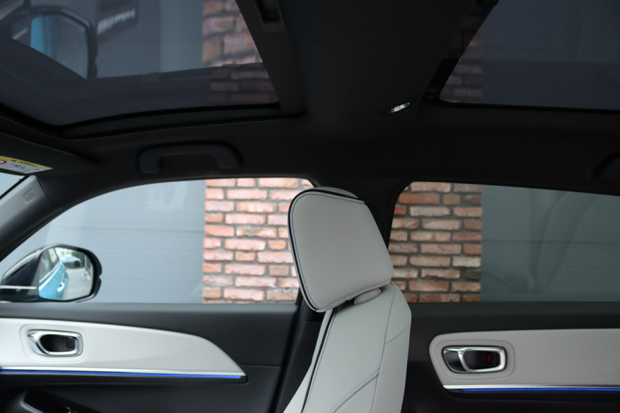 Honda e:Ny1 Elegance 69 kWh | Panoramadak | Adaptieve Cruise Control | Verwarmd Stuurwiel | Leder | Surround Camera | Apple Carplay/Android Auto | Dodehoekassistent | Stoelverwarming |