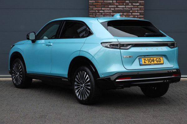Honda e:Ny1 Elegance 69 kWh | Panoramadak | Adaptieve Cruise Control | Verwarmd Stuurwiel | Leder | Surround Camera | Apple Carplay/Android Auto | Dodehoekassistent | Stoelverwarming |