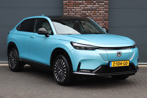 Honda e:Ny1 Elegance 69 kWh | Panoramadak | Adaptieve Cruise Control | Verwarmd Stuurwiel | Leder | Surround Camera | Apple Carplay/Android Auto | Dodehoekassistent | Stoelverwarming |