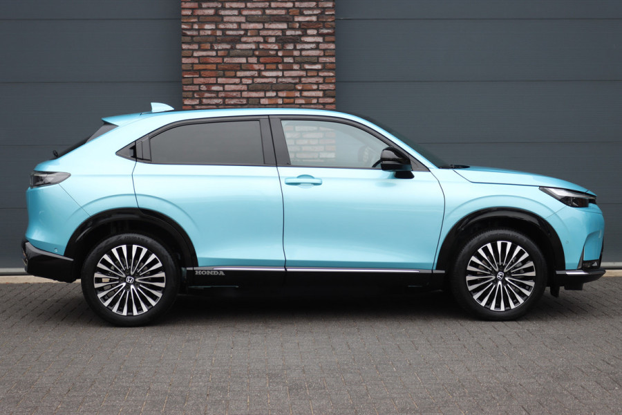 Honda e:Ny1 Elegance 69 kWh | Panoramadak | Adaptieve Cruise Control | Verwarmd Stuurwiel | Leder | Surround Camera | Apple Carplay/Android Auto | Dodehoekassistent | Stoelverwarming |