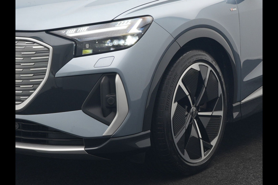 Audi Q4 e-tron 50 quattro S edition 77 kWh 299pk | Trekhaak Af Fabriek | Panodak | Adaptive Cruise | Head Up | Sonos Audio | Camera | Lederen Sportstoelen Memory & Verwarmd | Virtual | Navigatie | Keyless | 21"L.M |