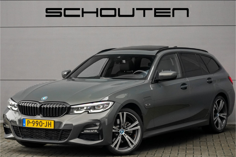 BMW 3 Serie Touring 320e M-Sport Dravitgrau Pano Leder Trekhaak 19"