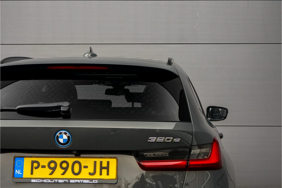 BMW 3 Serie Touring 320e M-Sport Dravitgrau Pano Leder Trekhaak 19"