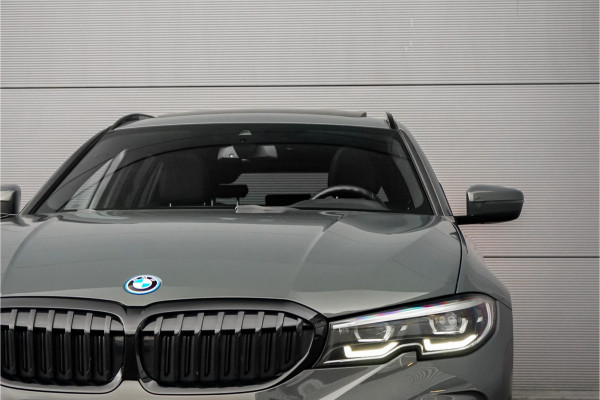 BMW 3 Serie Touring 320e M-Sport Dravitgrau Pano Leder Trekhaak 19"