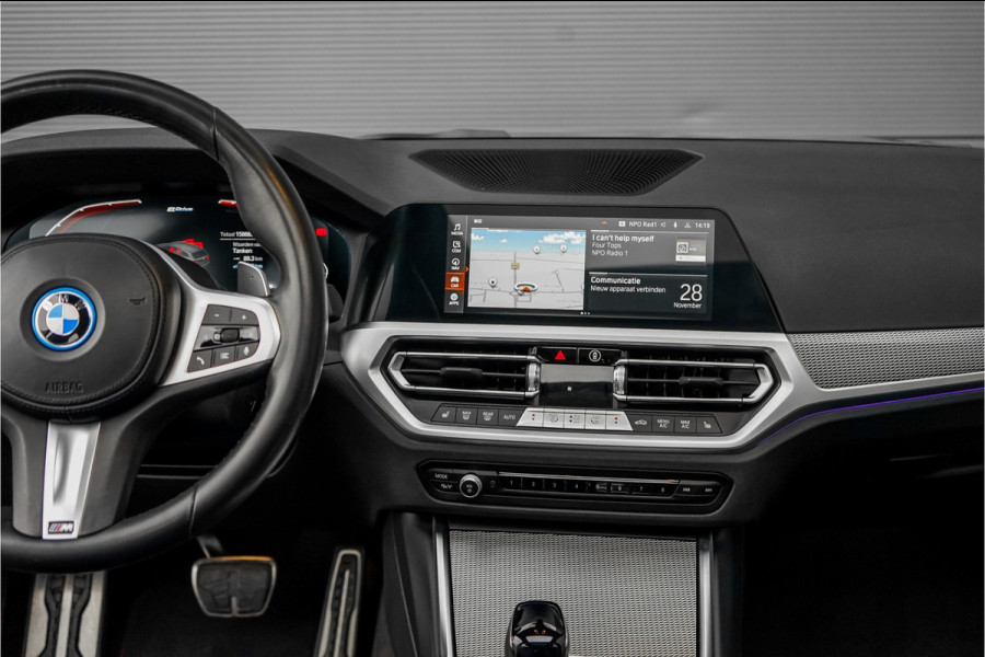 BMW 3 Serie Touring 320e M-Sport Dravitgrau Pano Leder Trekhaak 19"