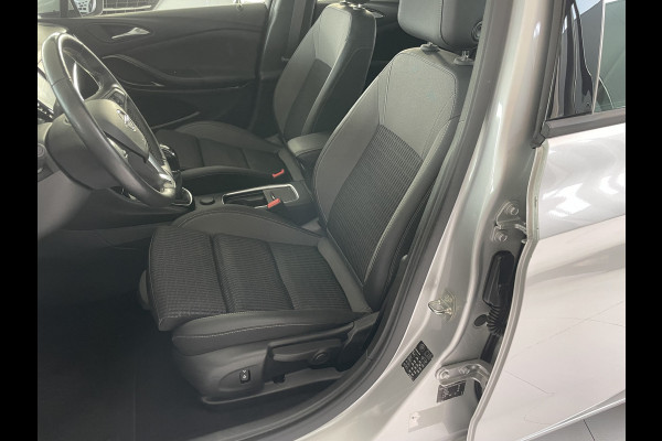 Opel Astra Sports Tourer 1.2 Business Elegance Airco - Cruise control - Parkeersensoren voor en achter - Achteruitrijcamera - Navigatie - Bluetooth - Keyless start and entry - Start/stop systeem - Stuur leder - Stuur multifunctioneel