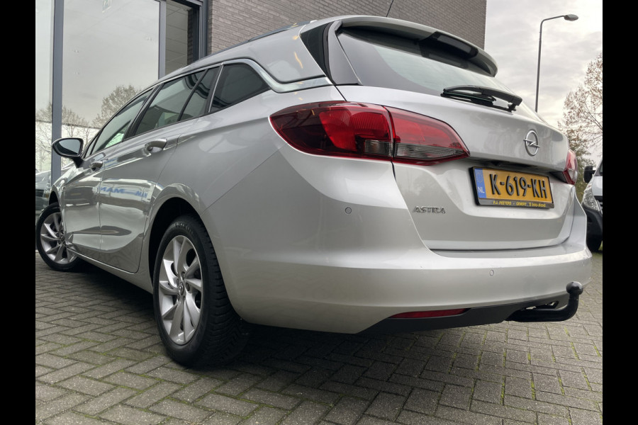 Opel Astra Sports Tourer 1.2 Business Elegance Airco - Cruise control - Parkeersensoren voor en achter - Achteruitrijcamera - Navigatie - Bluetooth - Keyless start and entry - Start/stop systeem - Stuur leder - Stuur multifunctioneel