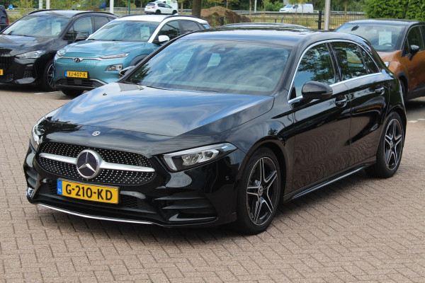 Mercedes-Benz A-Klasse 180 Business Solution AMG / Camera / Navigatie / 18'' / Dodehoek / Stoelverwarming / Cruise Control