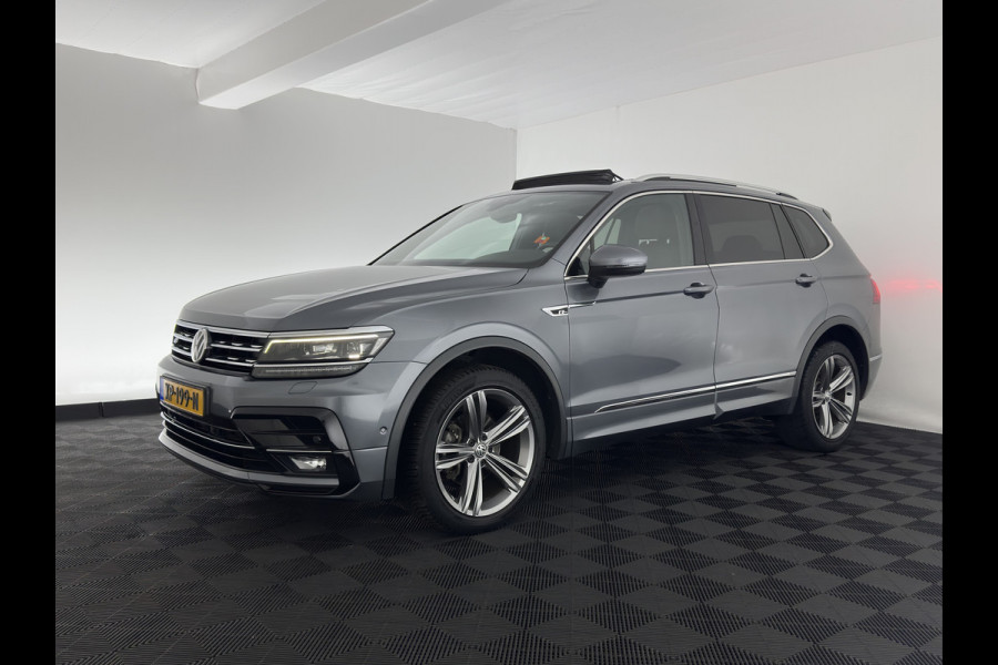 Volkswagen Tiguan Allspace 1.5 TSI R-line Highline Business (7-Pers.) (INCL-BTW) Aut * PANO | NAVI-FULLMAP | XENON | ALCANTARA | HEATED-ERGONOMIC-SPORTSEATS | KEYLESS | PRIVACY-GLASS | CAMERA | DAB | DIGI-COCKPIT | PDC | TOWBAR | ECC | 19"ALU*