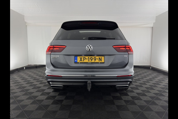 Volkswagen Tiguan Allspace 1.5 TSI R-line Highline Business (7-Pers.) (INCL-BTW) Aut * PANO | NAVI-FULLMAP | XENON | ALCANTARA | HEATED-ERGONOMIC-SPORTSEATS | KEYLESS | PRIVACY-GLASS | CAMERA | DAB | DIGI-COCKPIT | PDC | TOWBAR | ECC | 19"ALU*