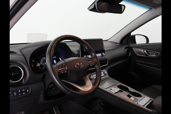 Hyundai Kona PREMIUM EV 64 KWH 1e EIG ACCU 92% GARANTIE 10-2030 BEREIK 466 KM ! LEDER. STUUR/STOEL VERWARMING.DODE HOEK DETECTIE