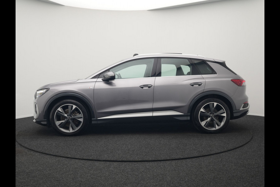 Audi Q4 e-tron 50 quattro S Line 77 kWh 299pk Dealer O.H. INCL BTW | Panodak | Lederen Sportstoelen Verwarmd | Keyless | Navigatie | Cruise Control | Virtual | DAB | Taifungrau Metallic |