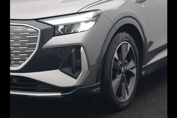 Audi Q4 e-tron 50 quattro S Line 77 kWh 299pk Dealer O.H. INCL BTW | Panodak | Lederen Sportstoelen Verwarmd | Keyless | Navigatie | Cruise Control | Virtual | DAB | Taifungrau Metallic |