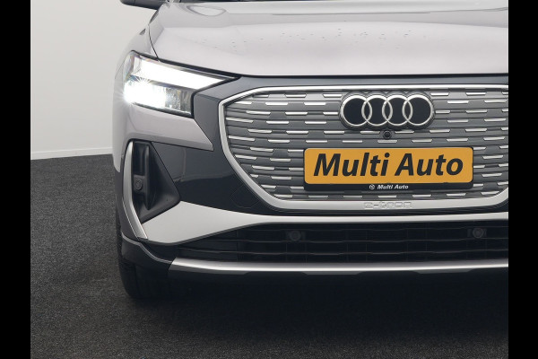 Audi Q4 e-tron 50 quattro S Line 77 kWh 299pk Dealer O.H. INCL BTW | Panodak | Lederen Sportstoelen Verwarmd | Keyless | Navigatie | Cruise Control | Virtual | DAB | Taifungrau Metallic |