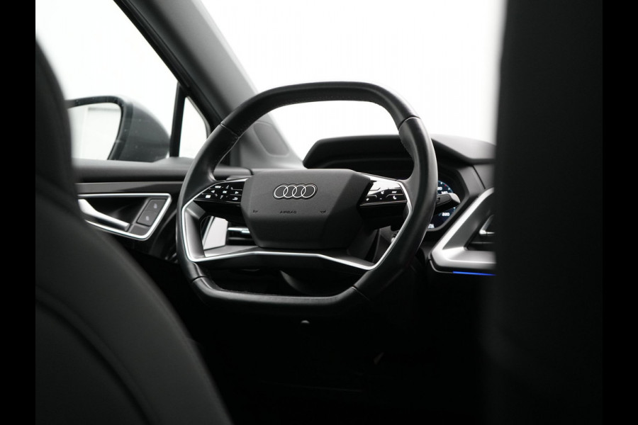 Audi Q4 e-tron 50 quattro S Line 77 kWh 299pk Dealer O.H. INCL BTW | Panodak | Lederen Sportstoelen Verwarmd | Keyless | Navigatie | Cruise Control | Virtual | DAB | Taifungrau Metallic |