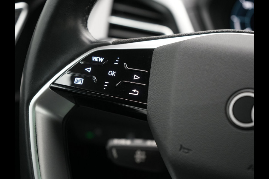 Audi Q4 e-tron 50 quattro S Line 77 kWh 299pk Dealer O.H. INCL BTW | Panodak | Lederen Sportstoelen Verwarmd | Keyless | Navigatie | Cruise Control | Virtual | DAB | Taifungrau Metallic |