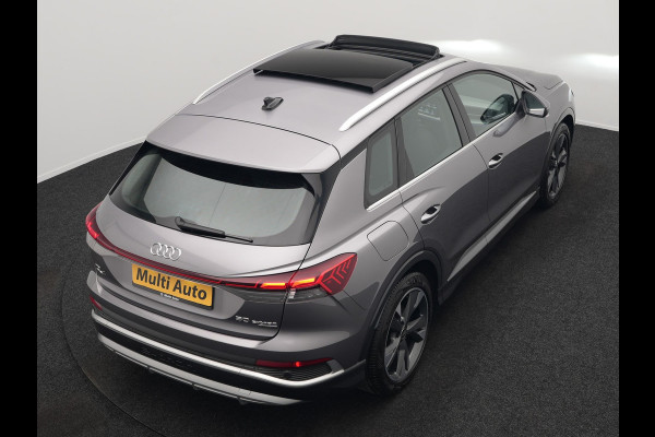 Audi Q4 e-tron 50 quattro S Line 77 kWh 299pk Dealer O.H. INCL BTW | Panodak | Lederen Sportstoelen Verwarmd | Keyless | Navigatie | Cruise Control | Virtual | DAB | Taifungrau Metallic |