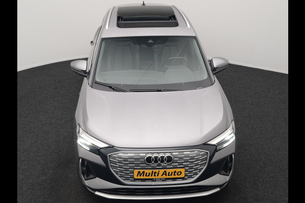 Audi Q4 e-tron 50 quattro S Line 77 kWh 299pk Dealer O.H. INCL BTW | Panodak | Lederen Sportstoelen Verwarmd | Keyless | Navigatie | Cruise Control | Virtual | DAB | Taifungrau Metallic |