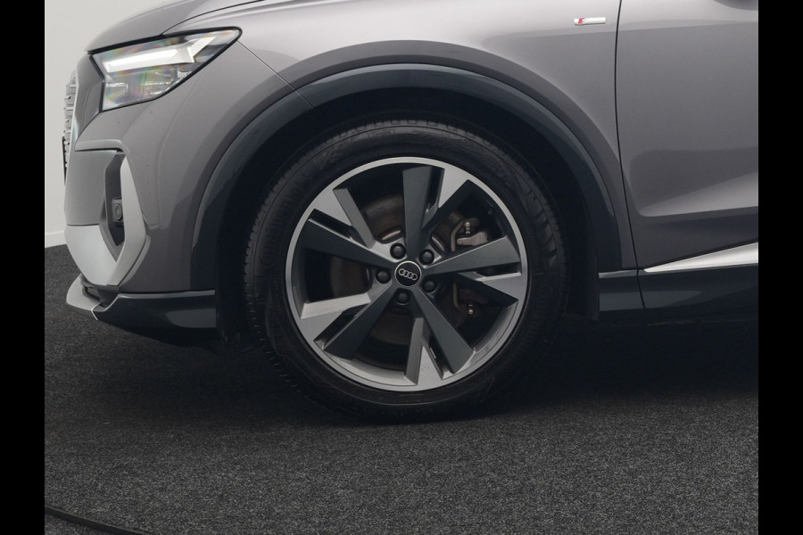 Audi Q4 e-tron 50 quattro S Line 77 kWh 299pk Dealer O.H. INCL BTW | Panodak | Lederen Sportstoelen Verwarmd | Keyless | Navigatie | Cruise Control | Virtual | DAB | Taifungrau Metallic |