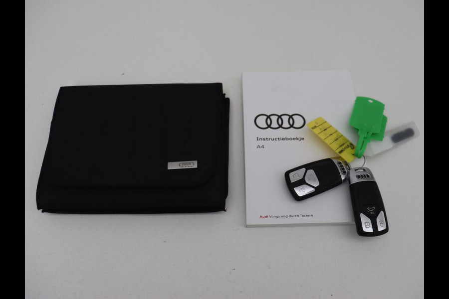 Audi A4 40 TFSI Sport S Line Black Edition | Stoelverwarming | Adaptive cruise | Keyless | Virtual Cockpit | Carplay | Half leder | Navigatie | Full LED | 19'' | Sportstoelen | Sfeerverlichting