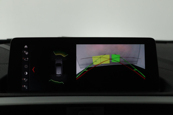 BMW 1-serie 118i Edition M Sport Shadow High Executive (STOELVERWARMING, ACHTERUITRIJCAMERA, PARKEERSENSOREN, DEALER ONDERHOUDEN)