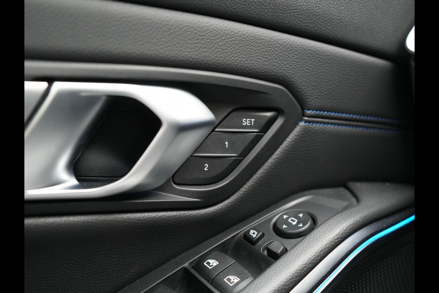 BMW 3 Serie Touring 330e M Sport Plug In Hybrid 293pk PHEV | Panodak | Adaptief Onderstel | Head Up | Adaptive Cruise | Laser LED || Camera | Alcantara Sportstoelen Memory & Verwarmd | Apple Carplay | Sfeerverlichting | Navigatie | Keyless | Bli