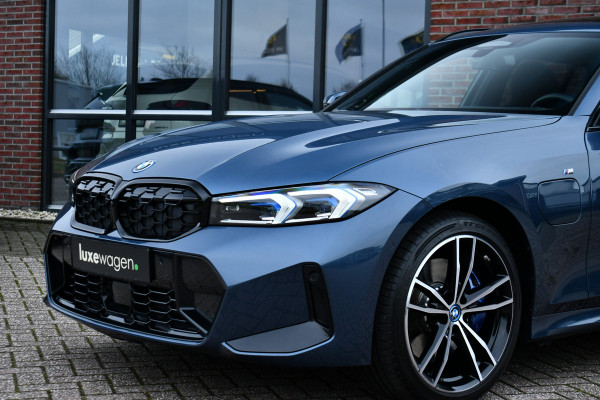 BMW 3 Serie Touring 330e M-Sport LCI-2 Pano Trekh ACC H/K 360 HUD 19inch