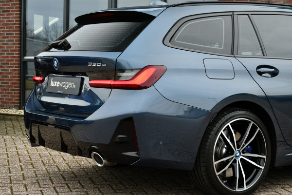 BMW 3 Serie Touring 330e M-Sport LCI-2 Pano Trekh ACC H/K 360 HUD 19inch