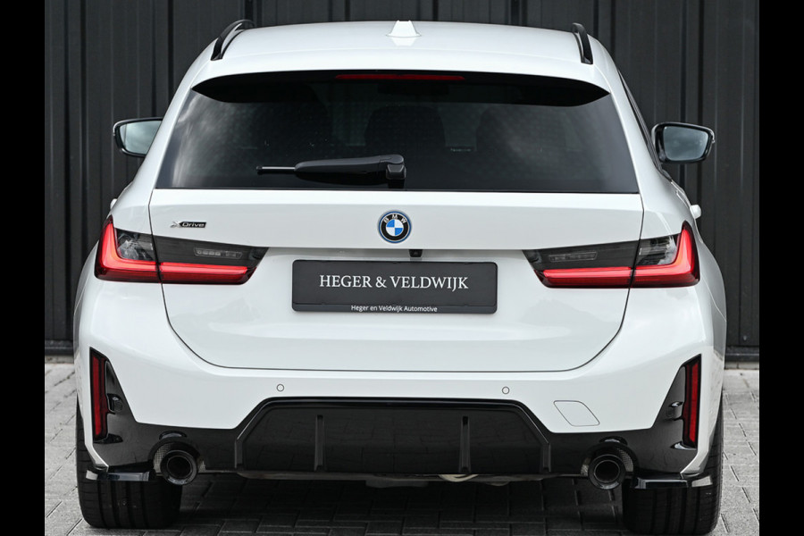 BMW 3 Serie Touring 330e xDrive M-SPORT | FACELIFT | ACCU 19,5 kWh | ACTIVE CRUISE | ELEKTR. TREKHAAK | HIFI AUDIO | SHADOW LINE | CAMERA |