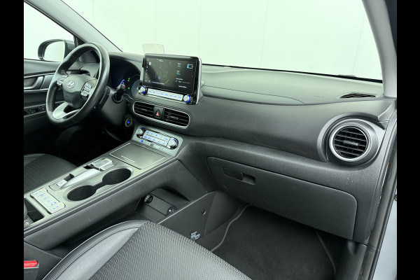 Hyundai Kona EV Premium 64kWh Leer SOH 100% Warmtepomp Krell®-Premium Audio Stoelverwarming+Koeling Camera Apple Carplay Android Auto Head-Up Stuurverwarming Elek.Stoelen Blind Spot Lane Assist VESS 1e Eigenaar Origineel Nederlandse Auto 45.000,-nieuw