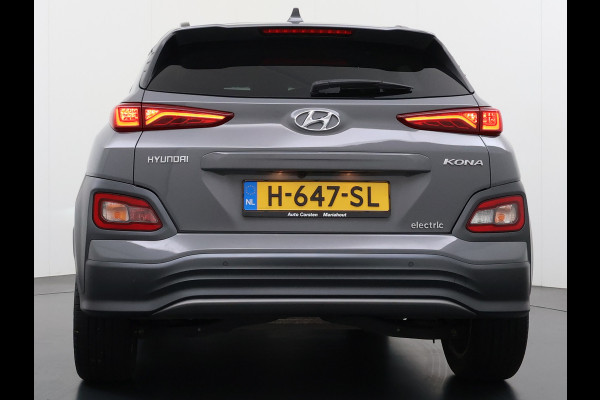 Hyundai Kona EV Premium 64kWh Leer SOH 100% Warmtepomp Krell®-Premium Audio Stoelverwarming+Koeling Camera Apple Carplay Android Auto Head-Up Stuurverwarming Elek.Stoelen Blind Spot Lane Assist VESS 1e Eigenaar Origineel Nederlandse Auto 45.000,-nieuw