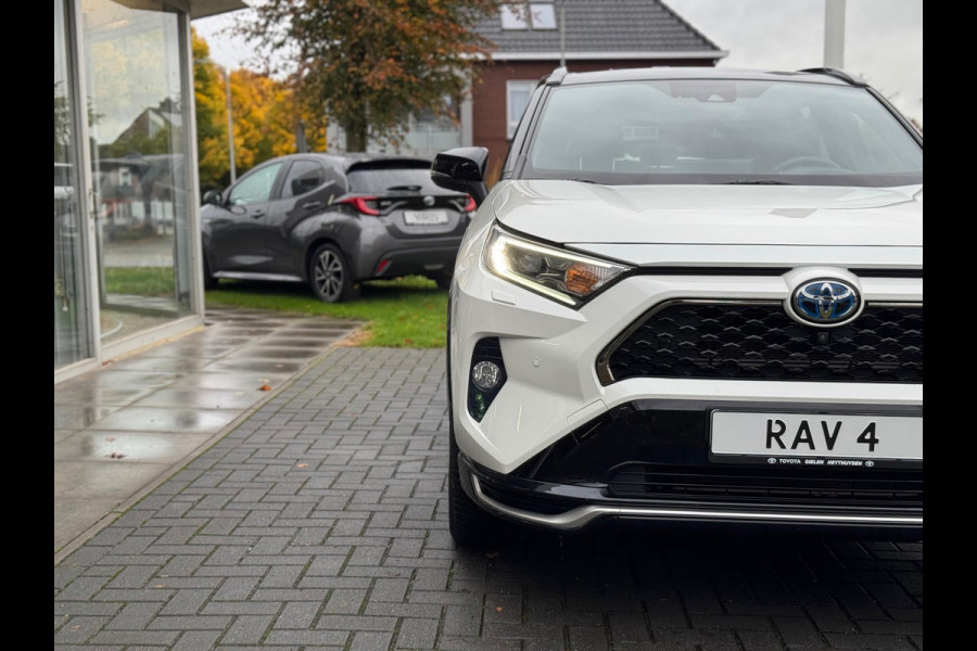 Toyota RAV4 2.5 Plug-in Hybrid AWD Bi-Tone Plus | Trekhaak, Head up display, JBL, Leer, Geheugenfunctie, 360 camera, Stoel+stuurverwarming,