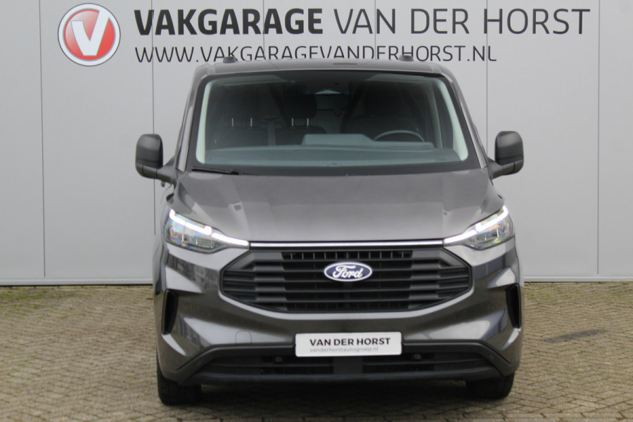 Ford Transit Custom 320 2.0-136 pk TDCI L1H1 Trend. Fabrieksgarantie tot 10-2028 ! Adapt. Cruise Cntrl, Navigatie, Camera, PDC V+A, Apple Carplay/Android auto, LED verl., Laadruimte bekleed, Bijrijdersbank, Spiegel-, stoel en voorraamverw. etc.