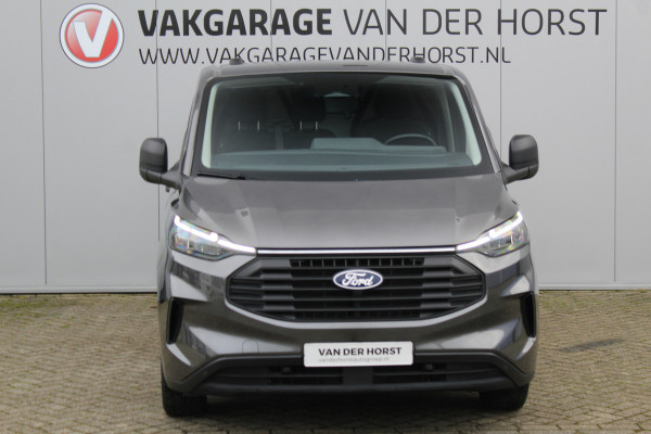 Ford Transit Custom 320 2.0-136 pk TDCI L1H1 Trend. Fabrieksgarantie tot 10-2028 ! Adapt. Cruise Cntrl, Navigatie, Camera, PDC V+A, Apple Carplay/Android auto, LED verl., Laadruimte bekleed, Bijrijdersbank, Spiegel-, stoel en voorraamverw. etc.