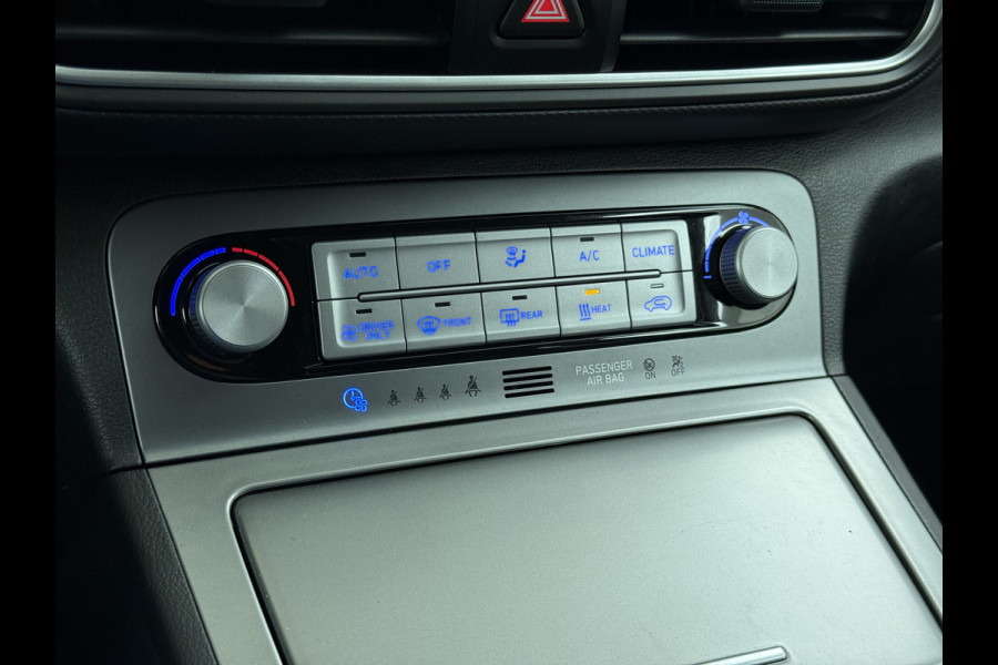 Hyundai Kona EV Premium 64kWh Leer SOH 100% Warmtepomp Krell®-Premium Audio Stoelverwarming+Koeling Camera Apple Carplay Android Auto Head-Up Stuurverwarming Elek.Stoelen Blind Spot Lane Assist VESS 1e Eigenaar Origineel Nederlandse Auto 45.000,-nieuw