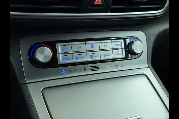 Hyundai Kona EV Premium 64kWh Leer SOH 100% Warmtepomp Krell®-Premium Audio Stoelverwarming+Koeling Camera Apple Carplay Android Auto Head-Up Stuurverwarming Elek.Stoelen Blind Spot Lane Assist VESS 1e Eigenaar Origineel Nederlandse Auto 45.000,-nieuw