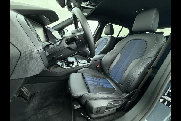 BMW 1-serie 118i Executive Edition M Sport | M SPORT | HARMAN & KARDON | ELEKTRISCHE ACHTERKLEP | CAMERA | ADAPTIVE CRUISE CONTROL | STOEL- & STUURVERWARMING | HEAD-UP | 19 INCH | INDIVIDUAL KLEUR STORM BAY METALLIC BOMVOL OPTIES