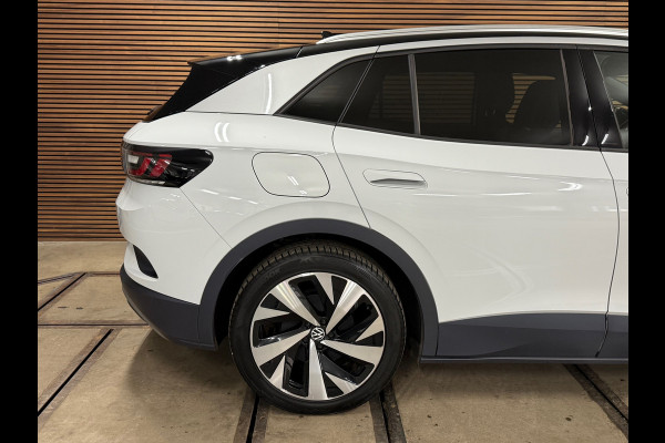Volkswagen ID.4 First 77 kWh | Navi | Camera | Adaptive Cruise | 1st | Leder / Alcantara | Trekhaak | BTW-Auto | Carplay
