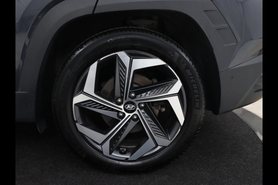 Hyundai Tucson 1.6 T-GDI PHEV Premium Sky 4WD | Panoramadak | Stoelventilatie | Leder | 360 Camera | Adaptive cruise | Memory | Achterbankverwarming | Carplay | Full LED | Navigatie | Plug In