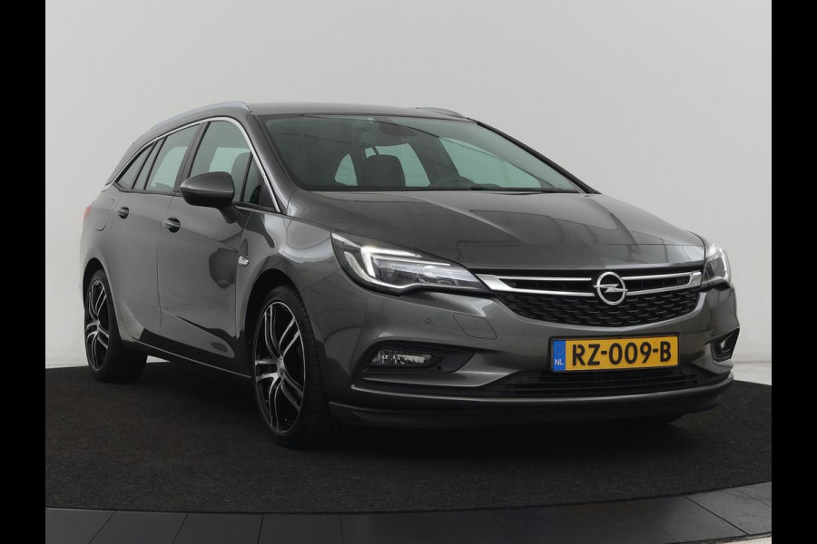 Opel Astra 1.6 CDTI Online Edition | Trekhaak | Carplay | Navigatie | Climate control | Comfortstoelen | 18'' | Parkeerhulp | Cruise control | Bluetooth