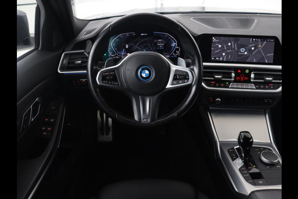 BMW 3-serie 320e M Sport | Leder | Trekhaak | Stoelverwarming | Carplay | Sportstoelen | Laserlicht | Live Cockpit | DAB | Parkeerhulp | Navigatie | Climate control | Bluetooth | Cruise control