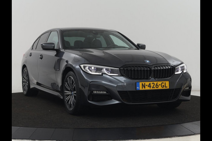 BMW 3-serie 320e M Sport | Leder | Trekhaak | Stoelverwarming | Carplay | Sportstoelen | Laserlicht | Live Cockpit | DAB | Parkeerhulp | Navigatie | Climate control | Bluetooth | Cruise control