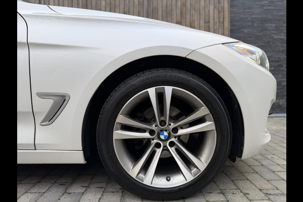 BMW 3-serie Gran Turismo 320i High Executive Automaat | Leer | Stoelverwarming | Cruise & climate control | Head-up display | Keyless entry | Trekhaak af