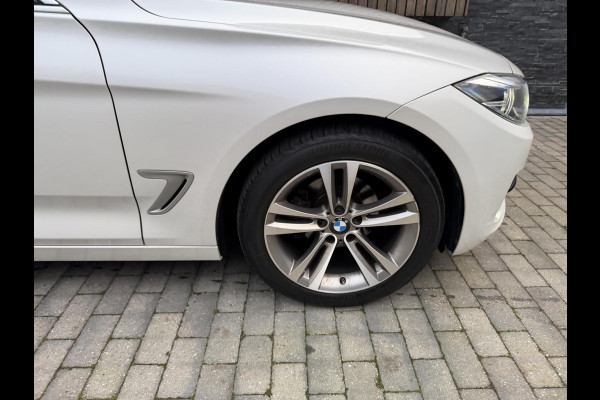 BMW 3-serie Gran Turismo 320i High Executive Automaat | Leer | Stoelverwarming | Cruise & climate control | Head-up display | Keyless entry | Trekhaak af